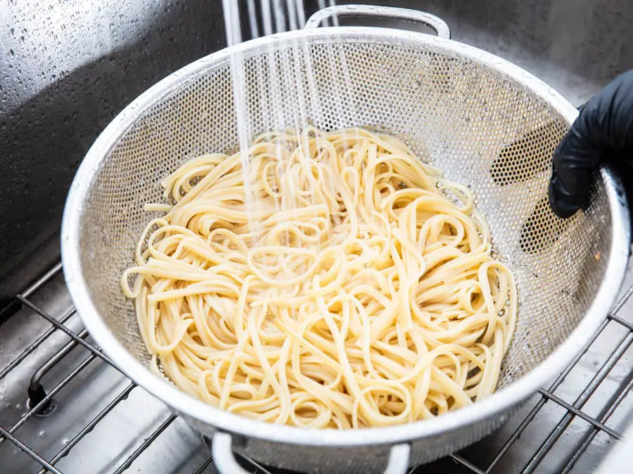 Pasta-Cooking Mistake #6: You Rinse The Pasta With Water