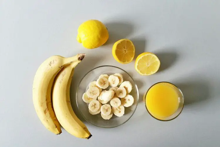 Coat the peeled or sliced bananas with citrus juice to slow down the oxidation.