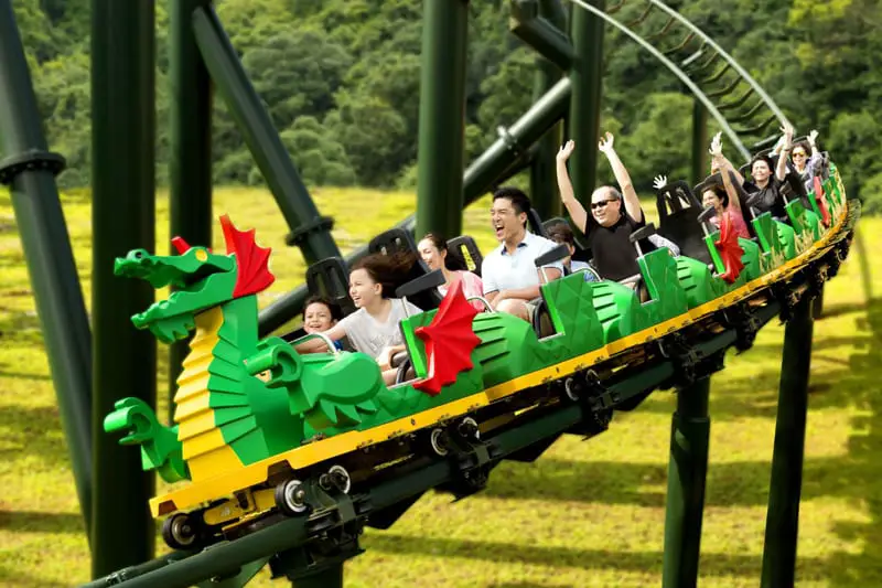 Enjoy the thrilling roller coasters ride of The Dragon in Legoland Malaysia