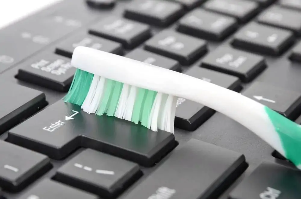 Old Toothbrush Hack #3: Clean Your Keyboard