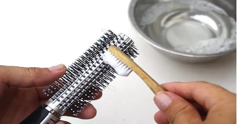 Old Toothbrush Hack #9: Clean Your Hairbrush