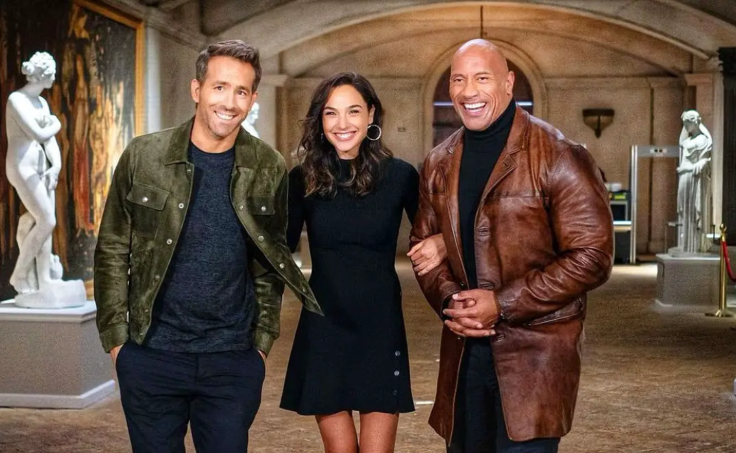 (L-R) Ryan Reynolds, Gal Gadot and Dwayne Johnson will appear in Netflix's "Red Notice" in 2021.